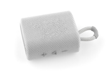 Wireless speaker on a white background. Round music speaker close-up.