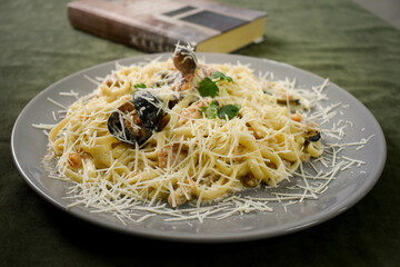 Dish of spaghetti allo scoglio, typical italian pasta with seafood sauce, Mediterranean Cuisine
