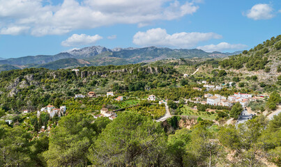 Fototapeta na wymiar Typical Andalusian mountain landscape and Village near Granada, Andalusia, Spain