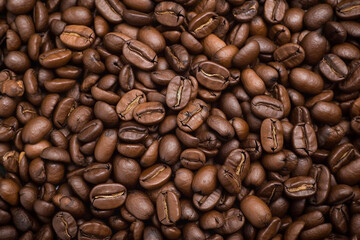 Fototapeta premium Coffee beans background. Conceptual abstract illustration with lots of coffee beans. Generative AI