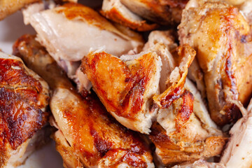 Sliced fried chicken on a white plate