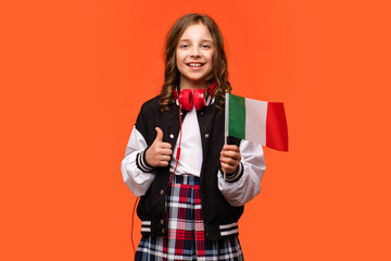 Girl holds small flag Italy