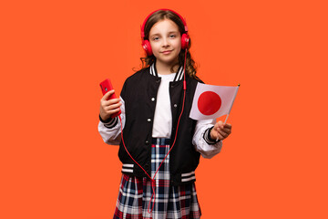 Girl holds small flag Japan