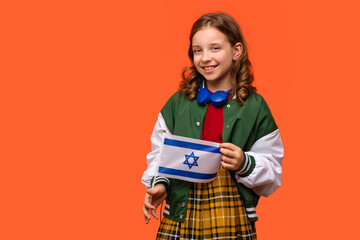 Girl holds small flag Israel