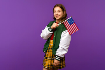 Girl holding small USA flag
