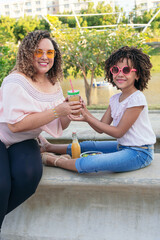 Mom And Daughter Enjoying Day At Park