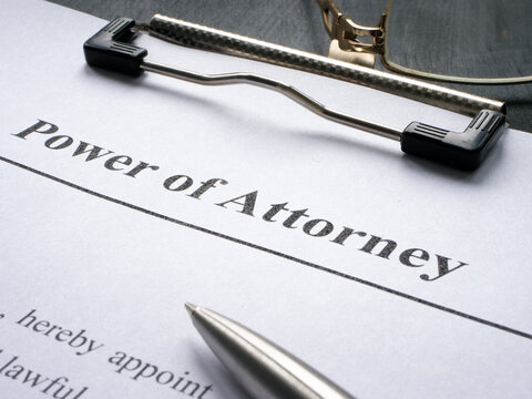 Clipboard With Power Of Attorney And Pen For Signing.