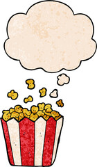 cartoon popcorn and thought bubble in grunge texture pattern style