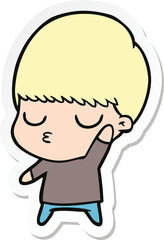 sticker of a cartoon calm boy
