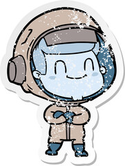 distressed sticker of a happy cartoon astronaut man