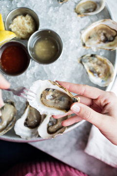 Enjoying Raw Oysters 