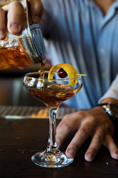Hand pouring old fashioned