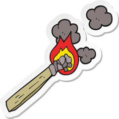 sticker of a cartoon burning wood torch