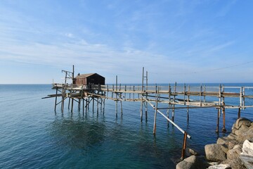 Photo of a trabucco, a fishermen's cottage on the coast of the Adriatic Sea in Termoli, Italy.