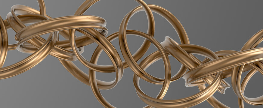 Gold rings on a gray background.
