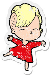 distressed sticker of a cartoon squinting girl