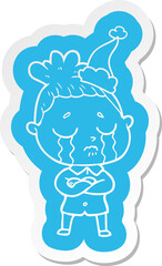 cartoon  sticker of a crying woman wearing santa hat