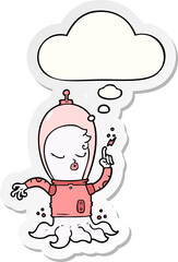 cute cartoon alien and thought bubble as a printed sticker