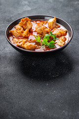 chicken meat tomato sauce, vegetable meal food snack on the table copy space food background rustic top view