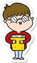sticker of a cartoon boy wearing spectacles carrying book
