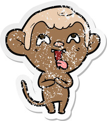 distressed sticker of a crazy cartoon monkey