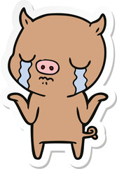 sticker of a cartoon pig crying