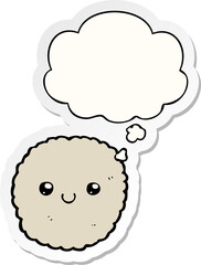 cartoon biscuit and thought bubble as a printed sticker