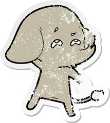 distressed sticker of a cartoon elephant remembering