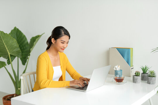 Online business, young professional at workplace. Working from home.