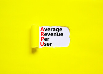 ARPU average revenue per user symbol. Concept words ARPU average revenue per user on white paper on beautiful yellow background. Business ARPU average revenue per user concept. Copy space.