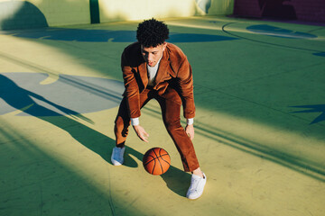 African-American man playing basketball