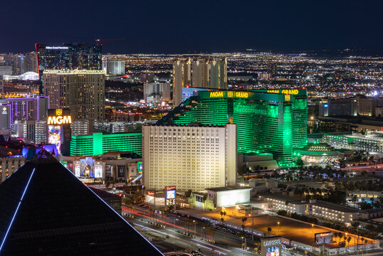 Las Vegas, United States - November 24, 2022: A picture of Las Vegas at night, showing the MGM Grand and the Tropicana Las Vegas - a DoubleTree by Hilton Hotel.