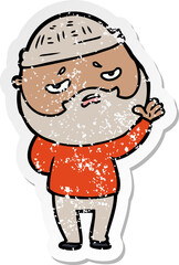 distressed sticker of a cartoon worried man with beard