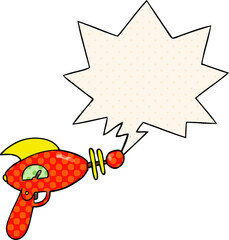 cartoon ray gun and speech bubble in comic book style