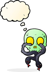 cartoon skull with snakes with thought bubble
