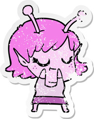 distressed sticker of a smiling alien girl cartoon