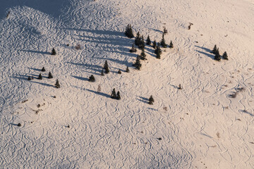Slalom tracks in the snow on a mountainside in Alpe D'Huez ski resort - France