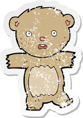 retro distressed sticker of a cartoon shocked teddy bear