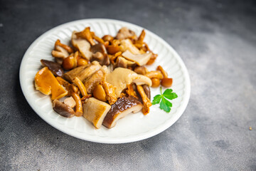 mushroom salad mix white mushroom, boletus, chanterelle appetizer meal food snack on the table copy space food background rustic top view