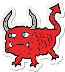 sticker of a cartoon little demon