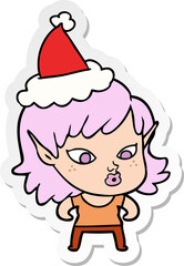 pretty sticker cartoon of a elf girl wearing santa hat