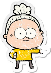 distressed sticker of a cartoon happy old woman