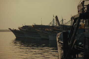 ship in the harbor at sunrise