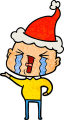 textured cartoon of a crying bald man wearing santa hat