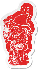 cartoon distressed sticker of a girl wearing futuristic clothes wearing santa hat
