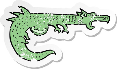 retro distressed sticker of a cartoon medieval dragon
