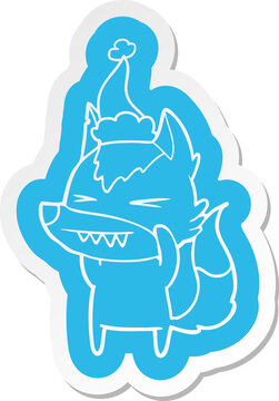 angry wolf cartoon  sticker of a wearing santa hat