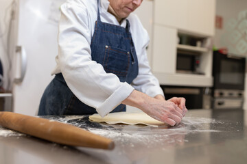 Pastry chef making sweets, rugelach and croasant