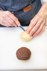 Pastry chef making sweets, rugelach and croasant