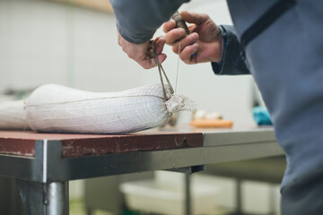 Butcher In A Meat Factory
